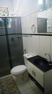 Bathroom sa Pousada Realiza