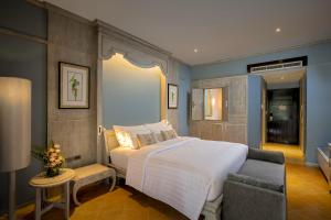 Кровать или кровати в номере Aonang Villa Resort I Beach Front