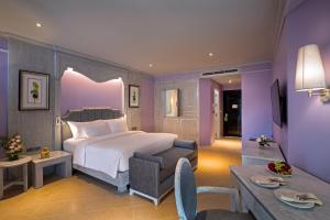 Кровать или кровати в номере Aonang Villa Resort I Beach Front