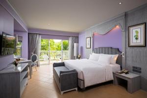 Кровать или кровати в номере Aonang Villa Resort I Beach Front
