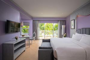 Кровать или кровати в номере Aonang Villa Resort I Beach Front