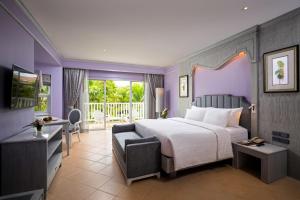 Кровать или кровати в номере Aonang Villa Resort I Beach Front