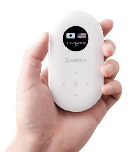 a hand holding a wii remote control at Hotel Route-Inn Nagoya Sakae in Nagoya