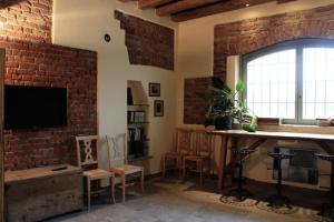 TV a/nebo společenská místnost v ubytování Agriturismo Cascina Pezzolo