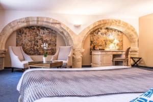 Posezení v ubytování Hôtel des Augustins