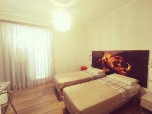 Postel nebo postele na pokoji v ubytování Il Microcosmo