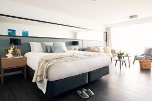 Krevet ili kreveti u jedinici u okviru objekta Daydream Island Resort