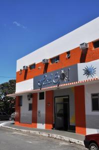 a building with a sign on the front of it at Hotel Sol Centro (Adults Only) in Goiânia