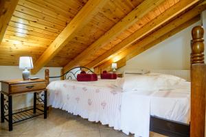 Posteľ alebo postele v izbe v ubytovaní Simona's Loft