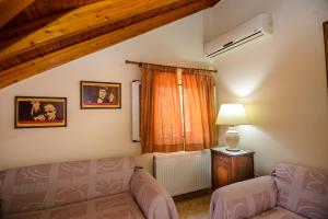 Posteľ alebo postele v izbe v ubytovaní Simona's Loft
