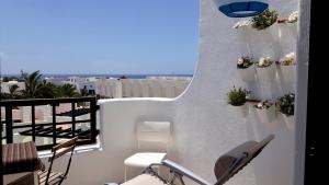 A balcony or terrace at Aqua Apt Sunrise & Sea Views