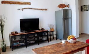 A kitchen or kitchenette at Aqua Apt Sunrise & Sea Views