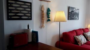 A seating area at Aqua Apt Sunrise & Sea Views