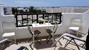 A balcony or terrace at Aqua Apt Sunrise & Sea Views