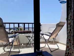 A balcony or terrace at Aqua Apt Sunrise & Sea Views