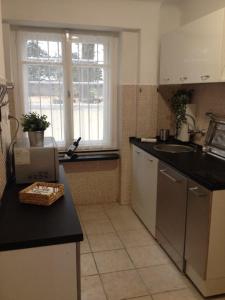 Kuchyňa alebo kuchynka v ubytovaní Budapest A+ Apartment