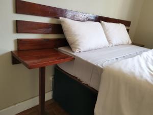 Ein Bett oder Betten in einem Zimmer der Unterkunft TD Guest House 1