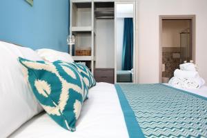 En eller flere senge i et værelse på b&b Za Maria