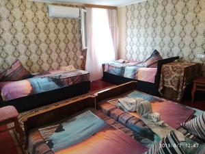 Postel nebo postele na pokoji v ubytování Downtown guest house