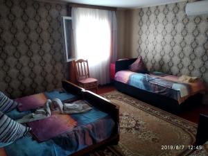 Voodi või voodid majutusasutuse Downtown guest house toas