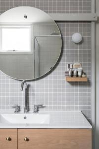 a bathroom with a sink and a mirror at Lancemore Lindenderry Red Hill in Red Hill