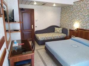 Posteľ alebo postele v izbe v ubytovaní Hotel de France