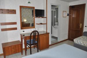 Posteľ alebo postele v izbe v ubytovaní Hotel de France