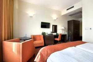 TV a/nebo společenská místnost v ubytování Hotel Tatra