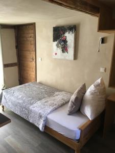 Postel nebo postele na pokoji v ubytování Schmuckkästle am Hafen