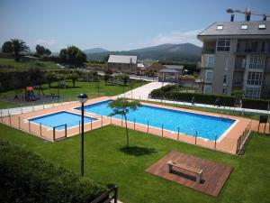 an overhead view of a swimming pool in a park at Marzan Playa in Foz