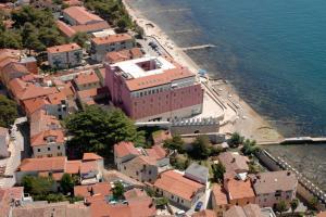 an aerial view of a town next to the water at Apartments Edo in Novigrad Istria