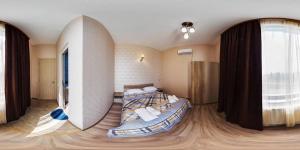 Voodi või voodid majutusasutuse Hotel Alley toas