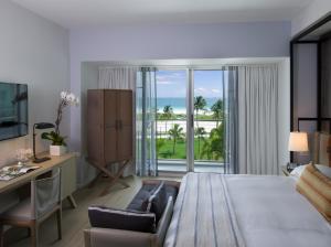 Postel nebo postele na pokoji v ubytování Hotel Victor South Beach