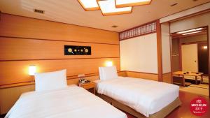 Letto o letti in una camera di Radium Kagaya Taipei