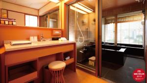 a bathroom with a toilet and a sink at Radium Kagaya Taipei in Taipei