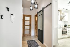 Kuchyňa alebo kuchynka v ubytovaní Old Town LTC - Apartments Starówka Panieńska