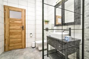 Kúpeľňa v ubytovaní Old Town LTC - Apartments Starówka Panieńska