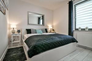Posteľ alebo postele v izbe v ubytovaní Old Town LTC - Apartments Starówka Panieńska