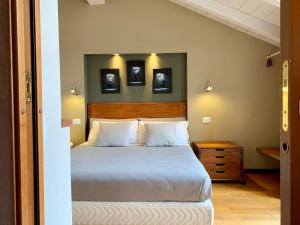 Postel nebo postele na pokoji v ubytování Porta Ronca - B&B, Suites & Apts