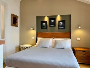 Postel nebo postele na pokoji v ubytování Porta Ronca - B&B, Suites & Apts