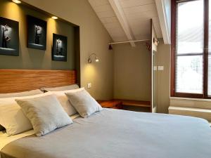 Postel nebo postele na pokoji v ubytování Porta Ronca - B&B, Suites & Apts