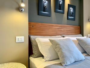 Postel nebo postele na pokoji v ubytování Porta Ronca - B&B, Suites & Apts