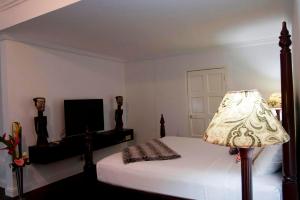 Katil atau katil-katil dalam bilik di Grand Hotel Excelsior Port Royal