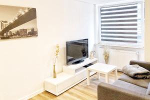 Televiisor ja/või meelelahutuskeskus majutusasutuses Work & Stay Apartment in Wuppertal