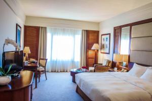 Postel nebo postele na pokoji v ubytování Danat Jebel Dhanna Resort
