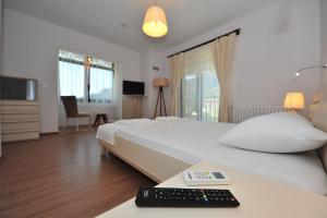 TV a/nebo společenská místnost v ubytování Egehan Butik Hotel Dalyan
