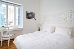 Voodi või voodid majutusasutuse Art in Athens Suite toas