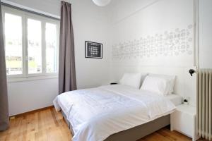 Voodi või voodid majutusasutuse Art in Athens Suite toas