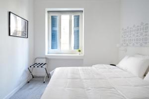 Voodi või voodid majutusasutuse Art in Athens Suite toas