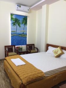 Katil atau katil-katil dalam bilik di Khách sạn Ngọc Thương +35 gambar